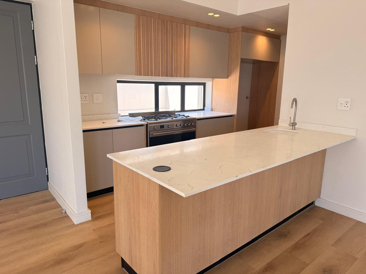 Light Oak Peninsula Kitchen — custom cabinetry by Modern Kitchens & Cupboards