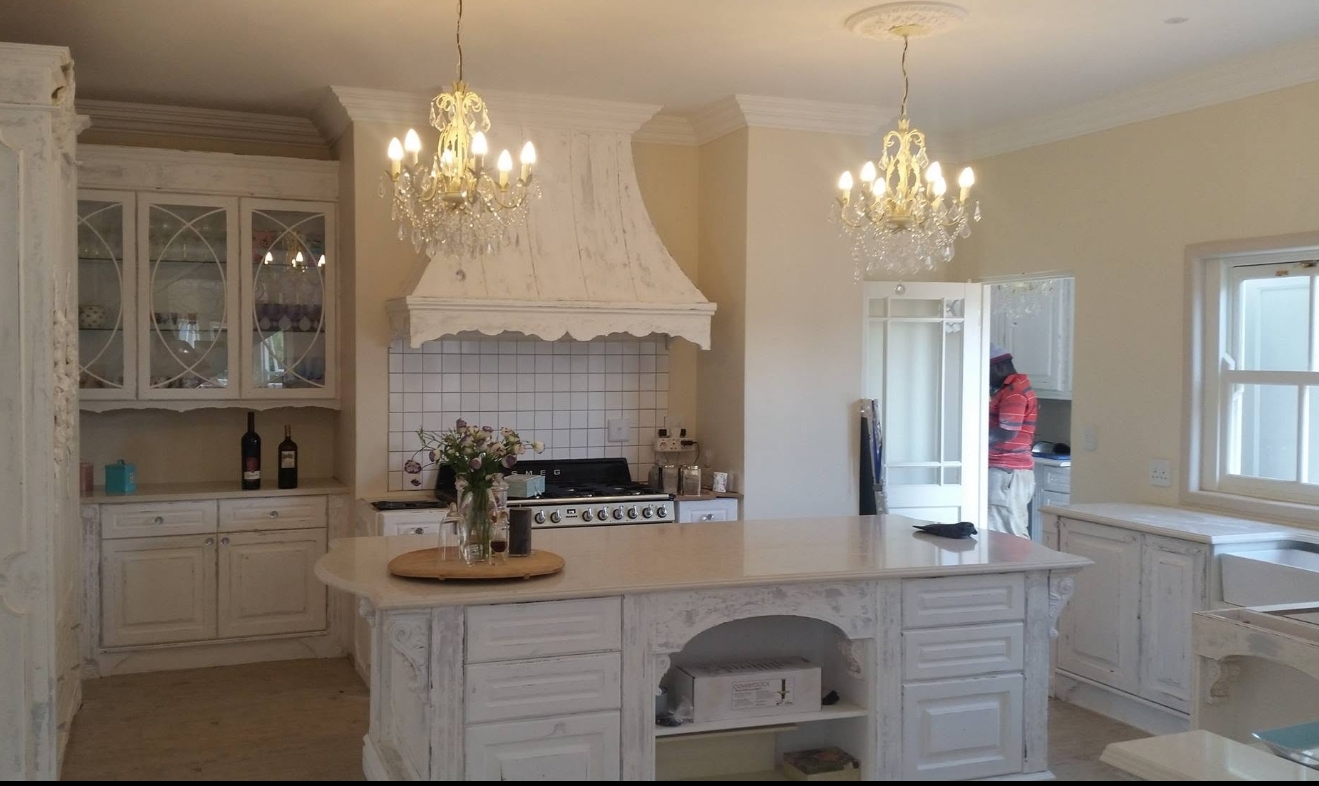 Antique-White Provençal Kitchen — custom cabinetry by Modern Kitchens & Cupboards