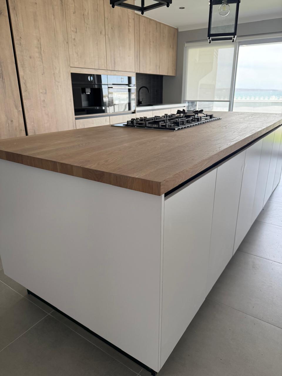 Matt White Island with Solid Oak Top — custom cabinetry by Modern Kitchens & Cupboards