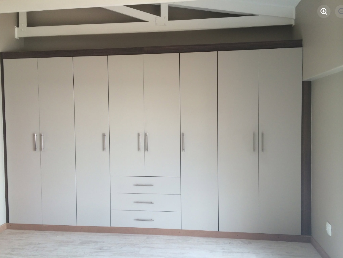 Eight-Door Built-in Wardrobe — custom cabinetry by Modern Kitchens & Cupboards