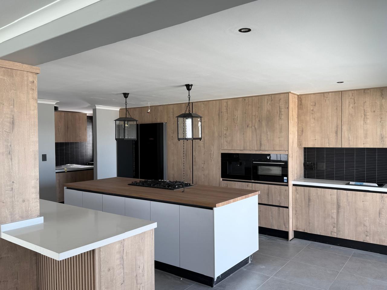 Oak Wrap Kitchen with Butcher-Block Island — custom cabinetry by Modern Kitchens & Cupboards
