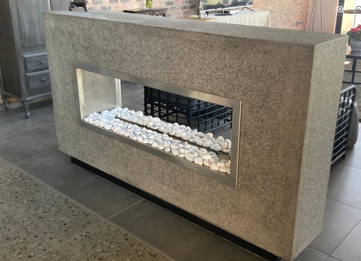 Stone-Clad Gas Fireplace Divider — custom cabinetry by Modern Kitchens & Cupboards