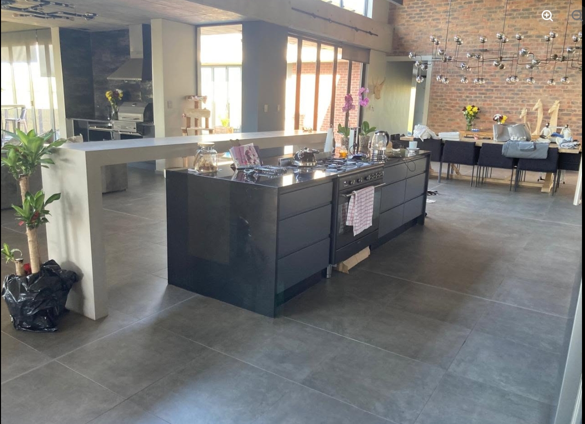 Graphite Gloss Open-Plan Kitchen — custom cabinetry by Modern Kitchens & Cupboards