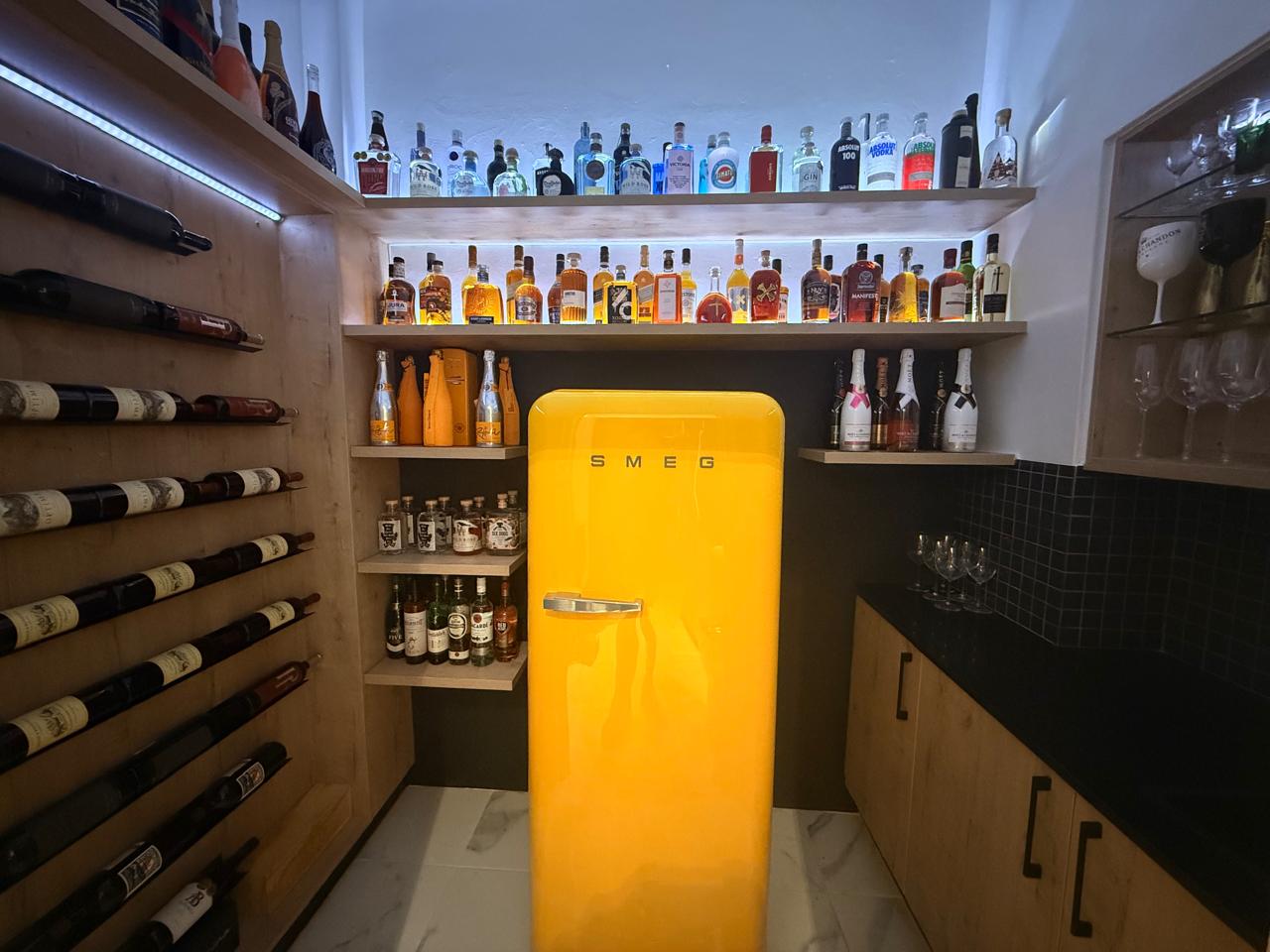 Wine Wall & Backlit Drinks Bar — custom cabinetry by Modern Kitchens & Cupboards
