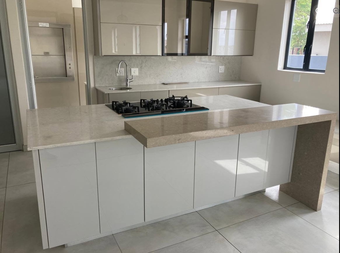 High-Gloss Island Kitchen — custom cabinetry by Modern Kitchens & Cupboards