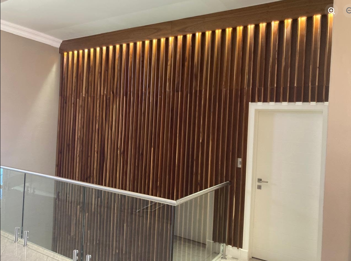 Backlit Timber Slat Feature Wall — custom cabinetry by Modern Kitchens & Cupboards