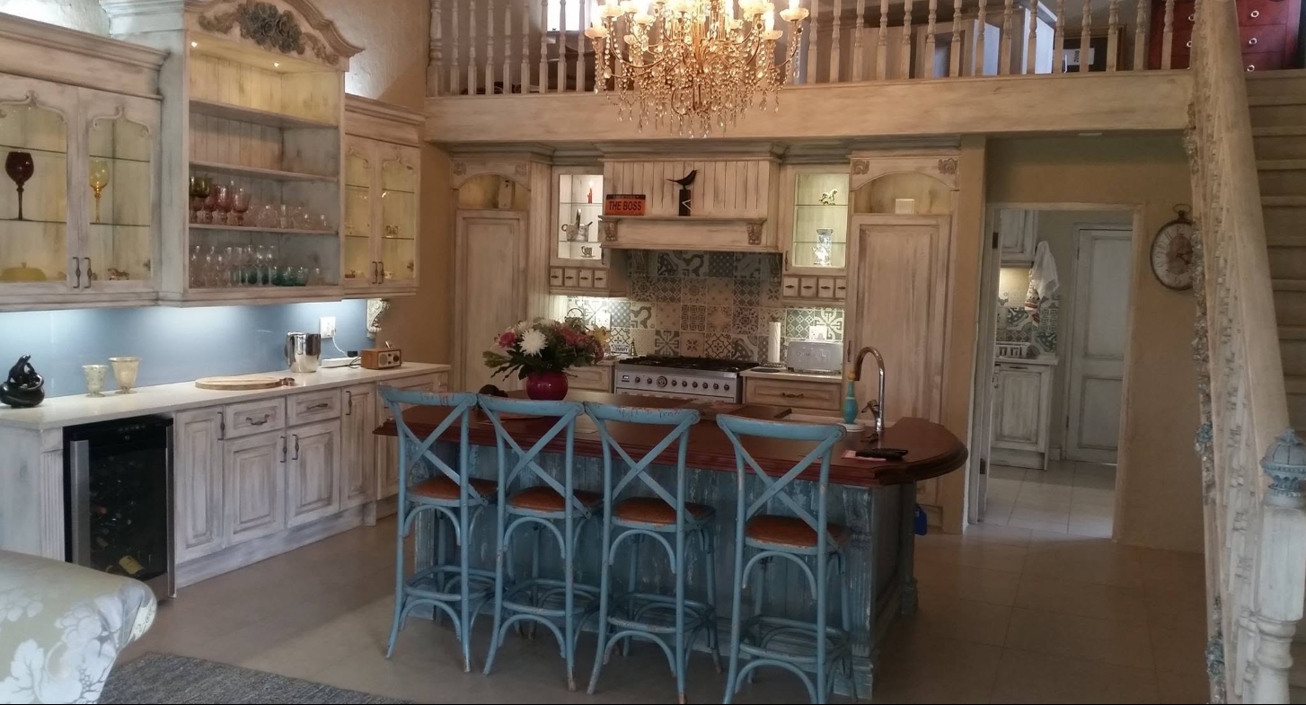 Limewashed Farmhouse Kitchen & Bar Island — custom cabinetry by Modern Kitchens & Cupboards