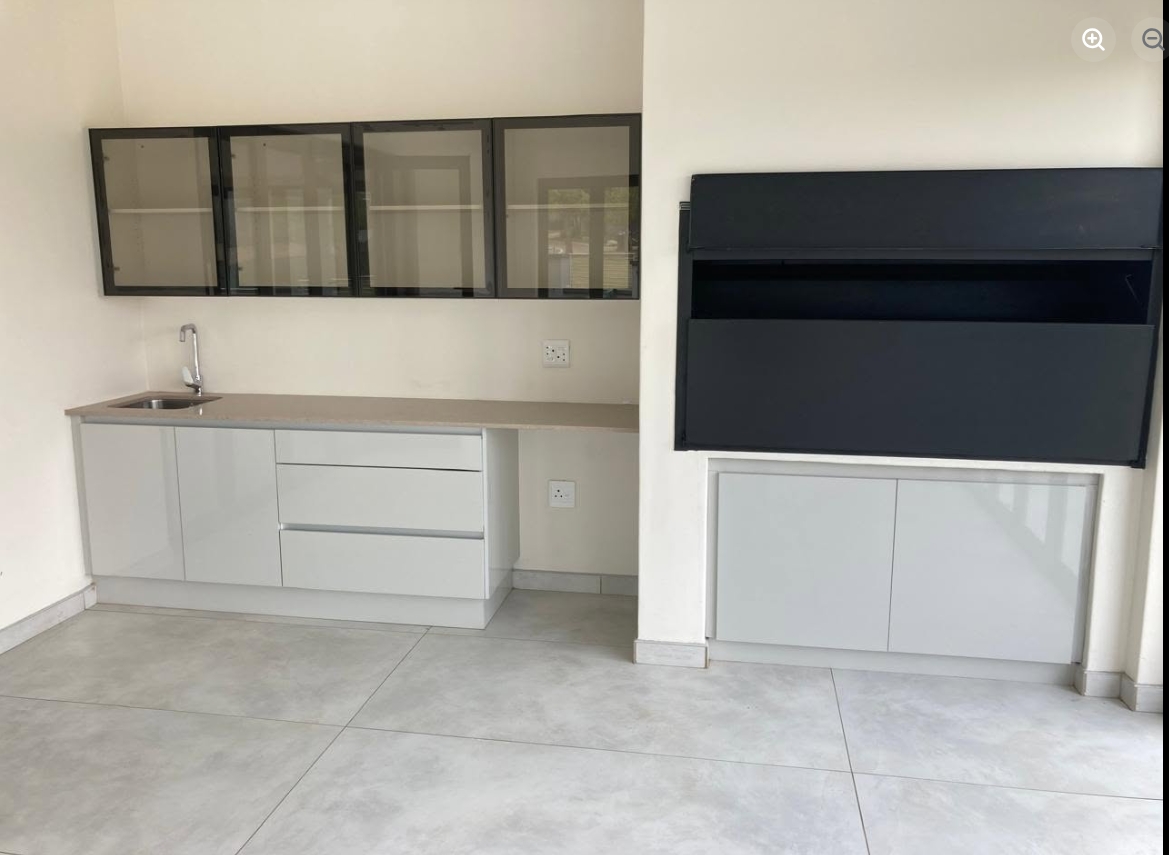 Patio Kitchenette & TV Housing — custom cabinetry by Modern Kitchens & Cupboards
