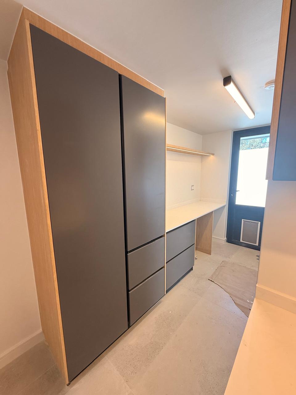 Grey & Oak Scullery with Integrated Fridge Housing — custom cabinetry by Modern Kitchens & Cupboards